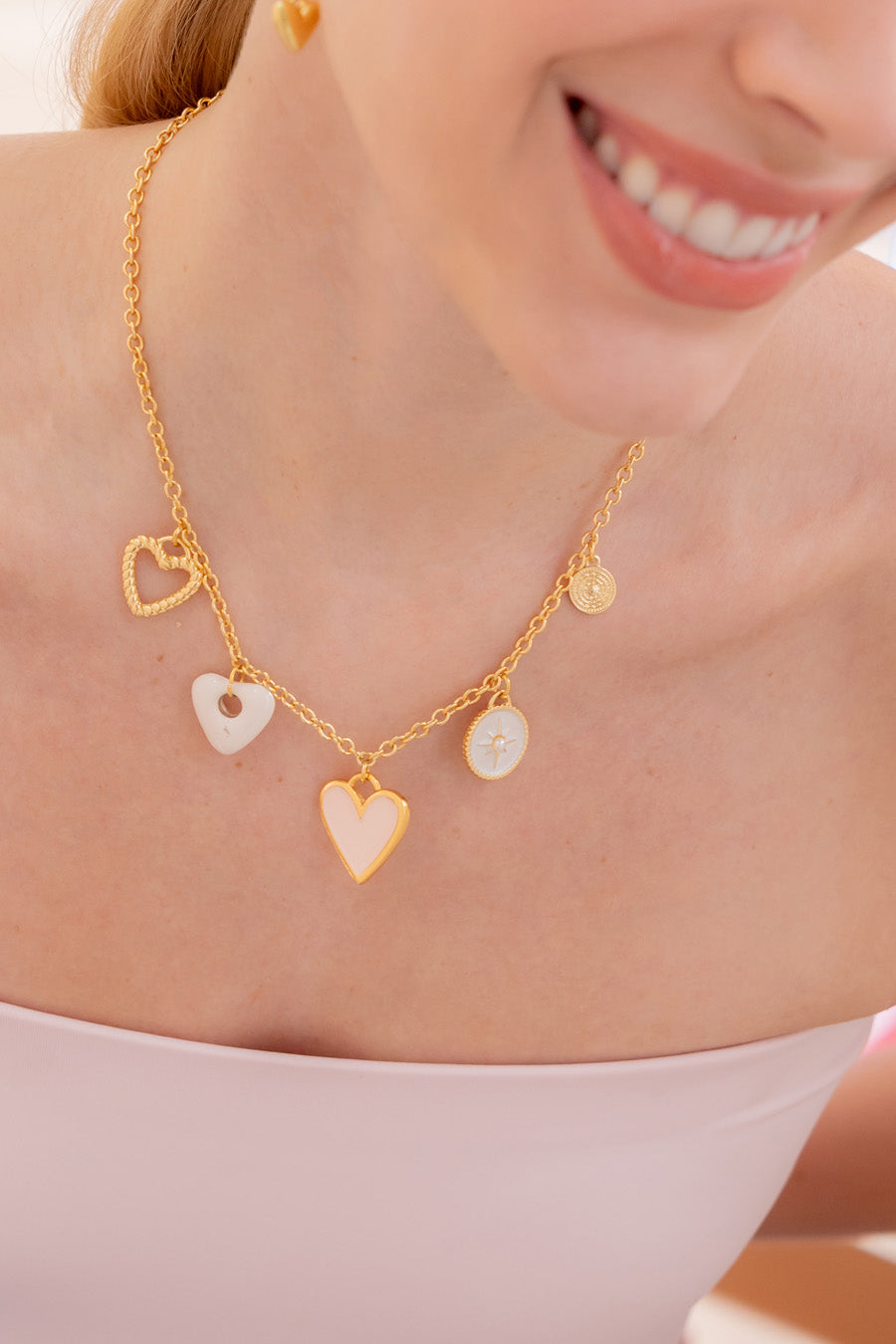 Collar Multicharms Corazones Nude + Aretes