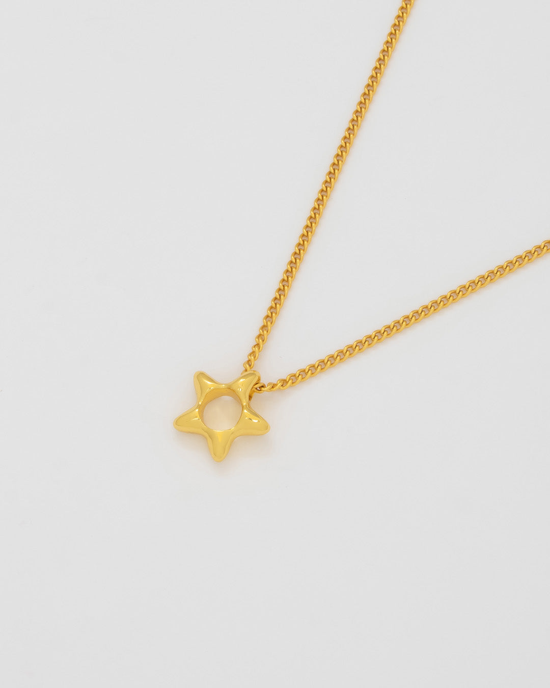 Collar estrella dorada