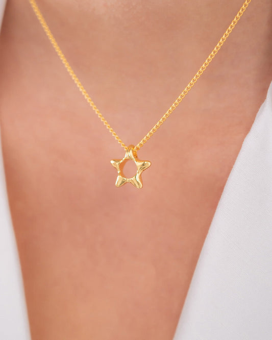 Collar estrella dorada