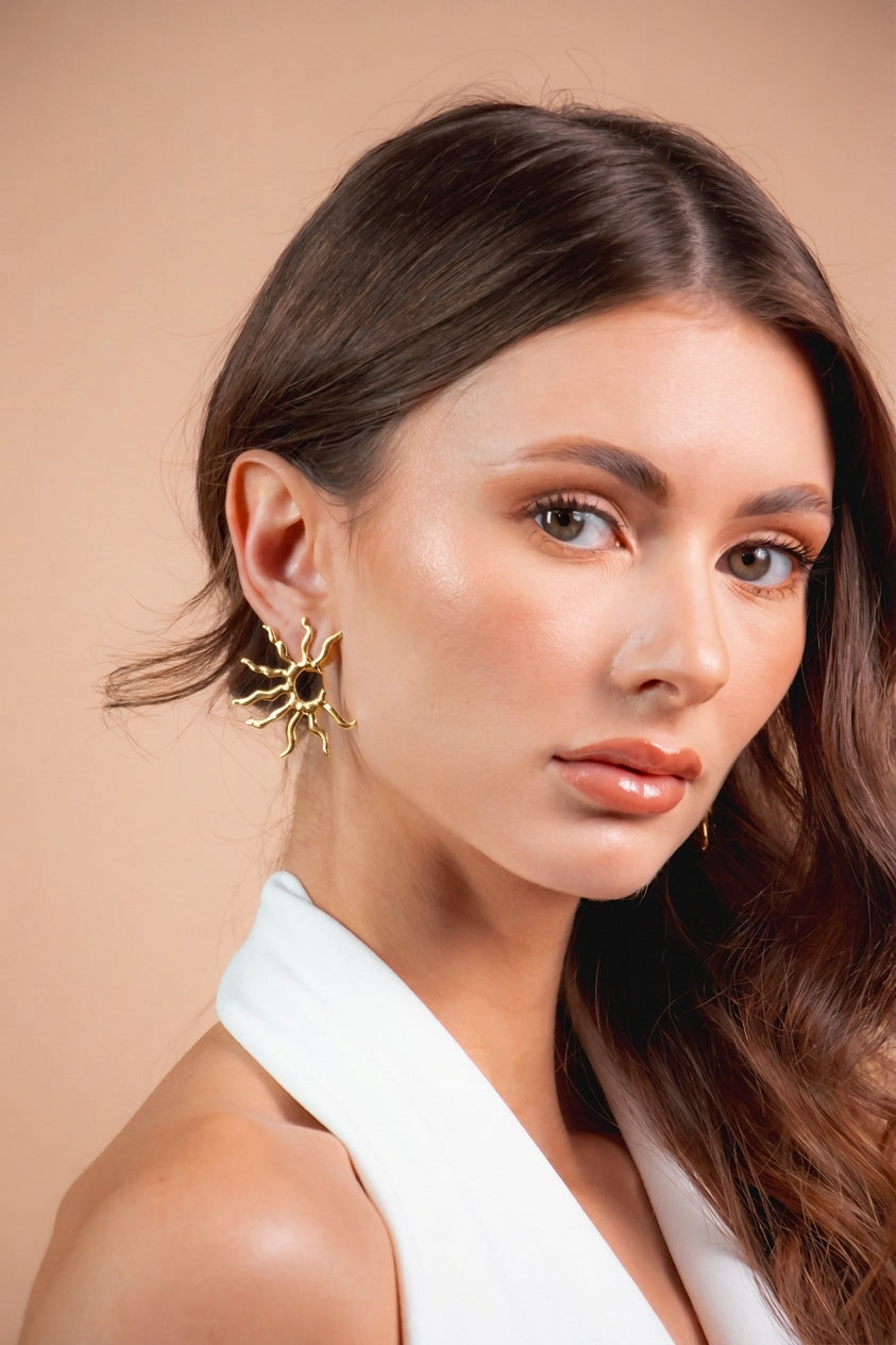 Aretes llamas del sol dorado
