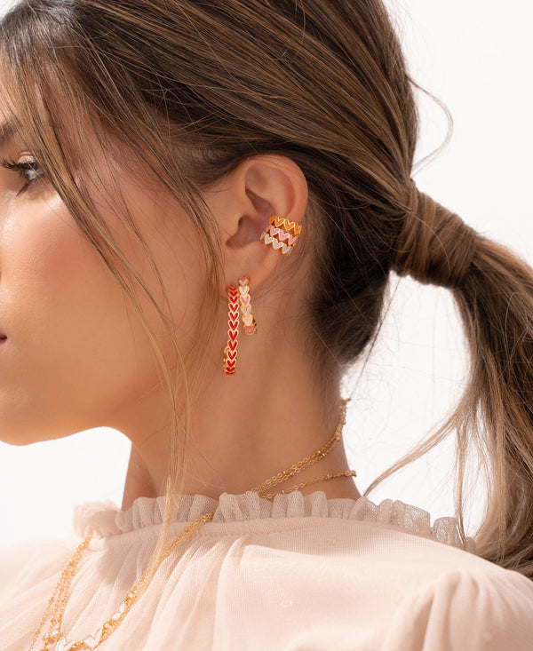 Set earcuff x 2 multicorazones negro y blanco